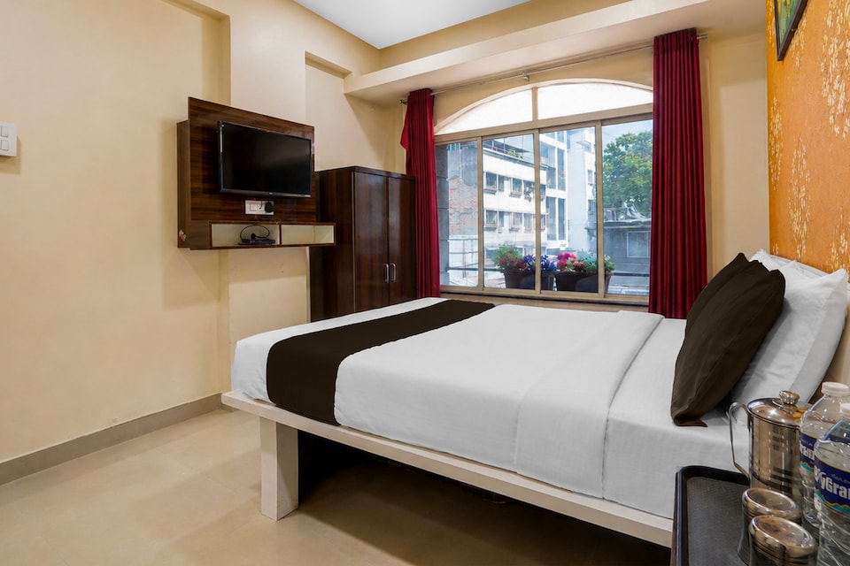 Collection O Dagdu Seth Ganpati Crossway Formerly Malwade Motels, Shivaji Nagar  Pune, Pune
