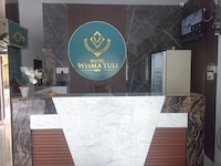Hotel O near Masjid Raya Al-Mashun formerly Hotel Wisma Yuli