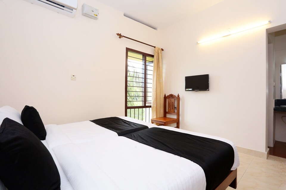 Capital O 15150 Hotel Townhouse Club - Near Airport - Trivandrum, Airport Trivandrum, Trivandrum