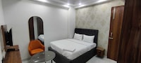 Hotel O Corporate Suites near Botanical Garden Metro Station