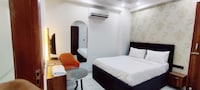 Hotel O Corporate Suites near Botanical Garden Metro Station