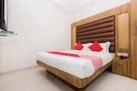 OYO Hotel Grand Residency Near Marine Drive Beach
