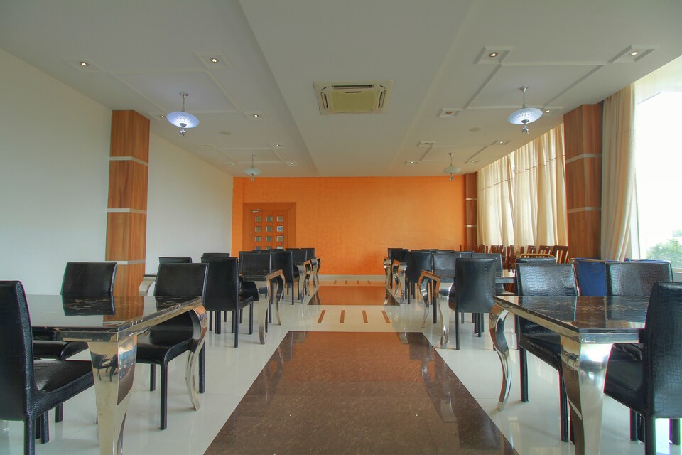 Capital O 16429 New Milestone Hotel, Mysore Outer-II, Mysore