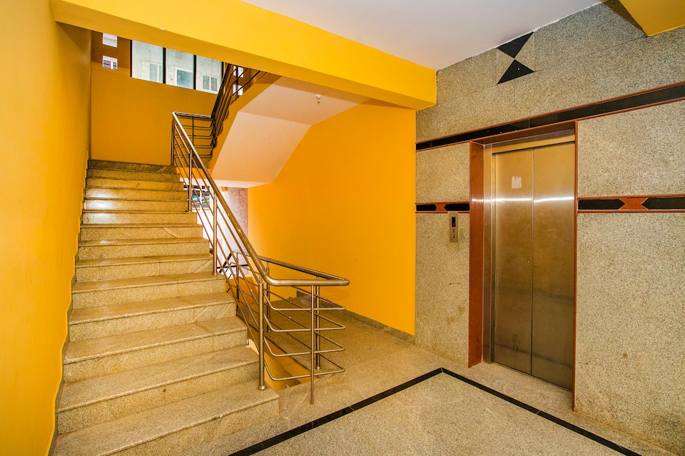 OYO 16500 Airport Royal Comforts, Airport Road Bangalore, Bangalore