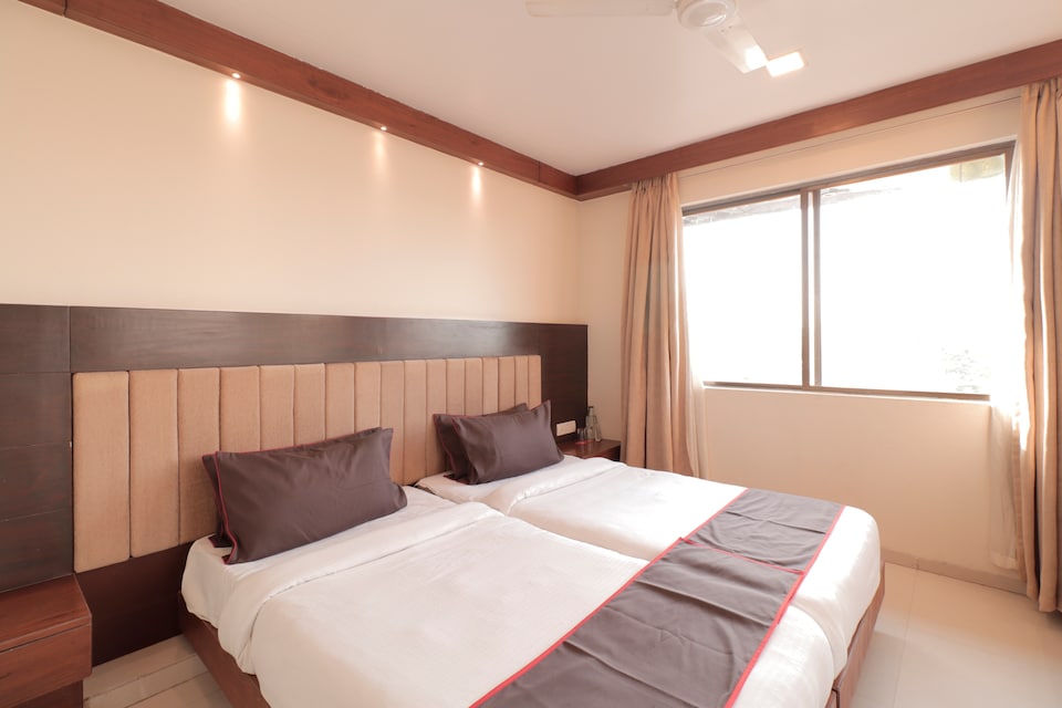 Collection O 17196 Metro Inn Avadh Arcade, Satellite-Prahlad Nagar Ahmedabad, Ahmedabad