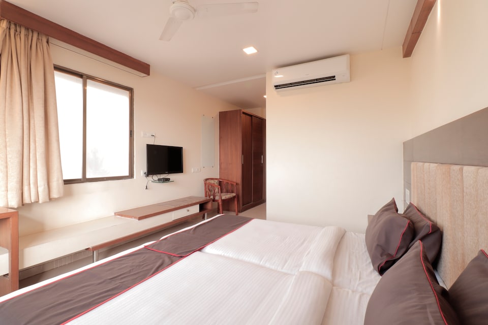 Collection O 17196 Metro Inn Avadh Arcade, Satellite-Prahlad Nagar Ahmedabad, Ahmedabad