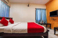 OYO Maanne Hospitality Services Near Alcazar Mall