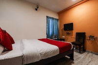 OYO Maanne Hospitality Services Near Alcazar Mall