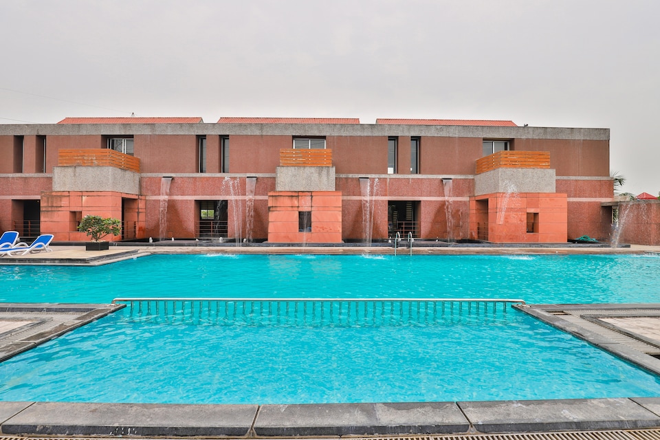 OYO 17445 Harshraj Heaven, Kamrej Surat, Surat