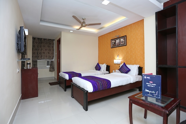 Capital O Elevens Inn