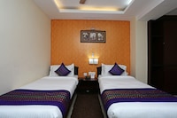 Capital O Elevens Inn