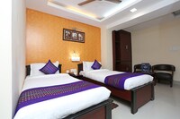 Capital O Elevens Inn