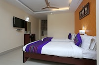 Capital O Elevens Inn