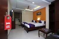 Capital O Elevens Inn