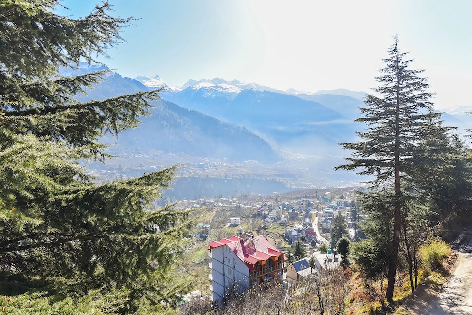 OYO 24180 कार्तिकेय इन गेस्ट हाउस, Kanyal Road, मनाली