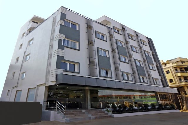 Capital O Hotel Palm International