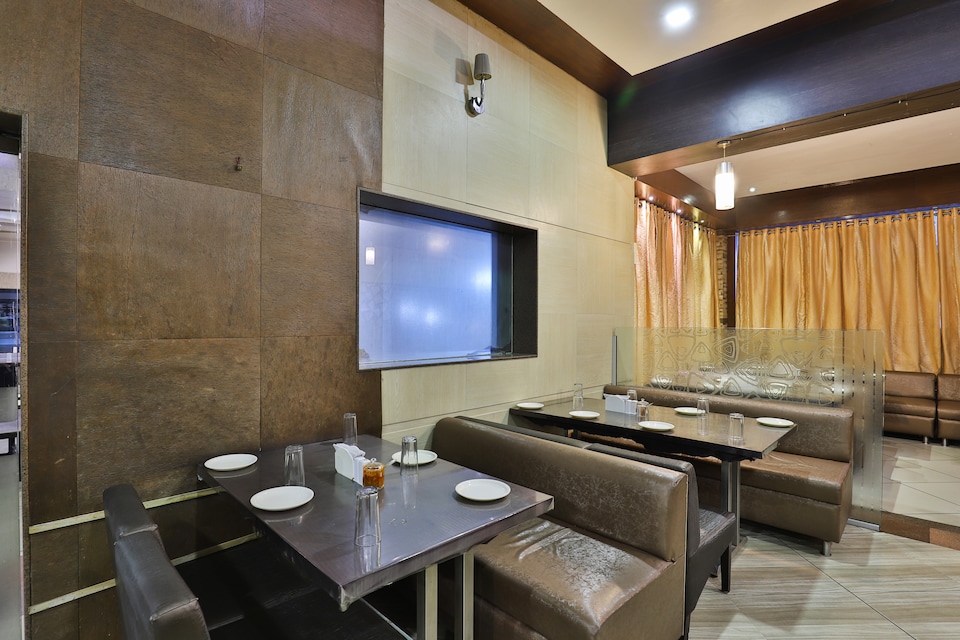 Capital O 26998 Ravi Raj Hotel, SG Highway Ahmedabad, Ahmedabad