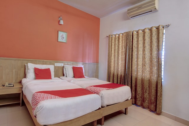 OYO The Woodbridge Hotel Near Ragigudda Sri Prasanna Anjaneyaswamy Temple