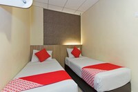 OYO 615 Dragon Inn Premium Hotel