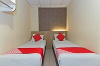 OYO 615 Dragon Inn Premium Hotel