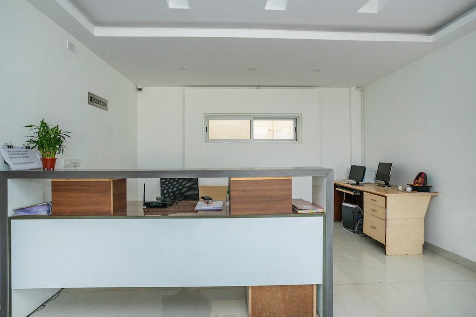 Hotel O Cosmopolitan, Airport Road Bangalore-II, Bangalore