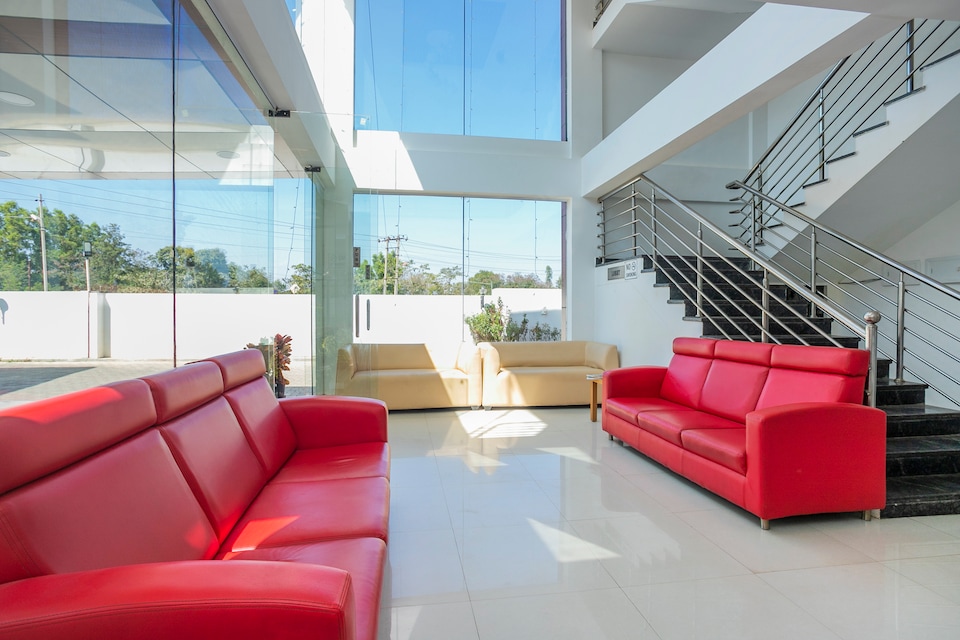 Hotel O Cosmopolitan, Airport Road Bangalore-II, Bangalore