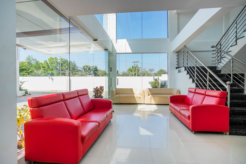 Hotel O Cosmopolitan, Airport Road Bangalore-II, Bangalore