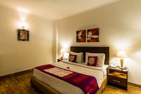 OYO Hotel Pluto's Near Ambience Mall