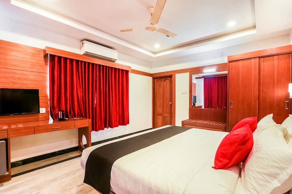 Capital O Hotel Chembarathy Garden, Kannur, Kannur