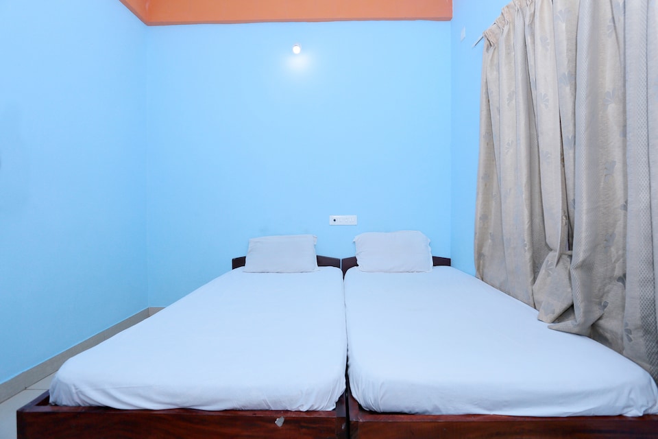 SPOT ON 36996 Manasa Tourist Home, M G Road Trivandrum, Trivandrum