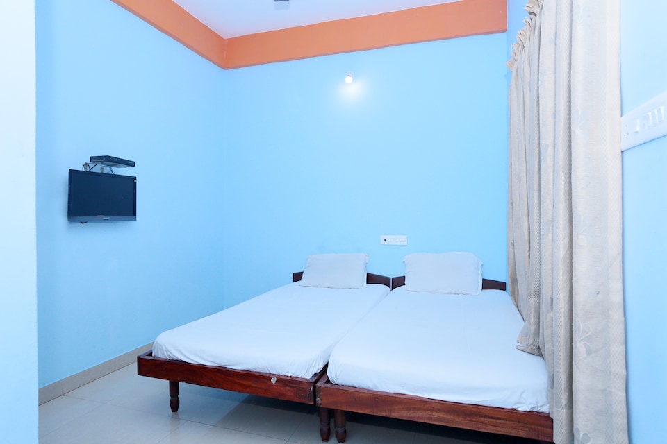 SPOT ON 36996 Manasa Tourist Home, M G Road Trivandrum, Trivandrum