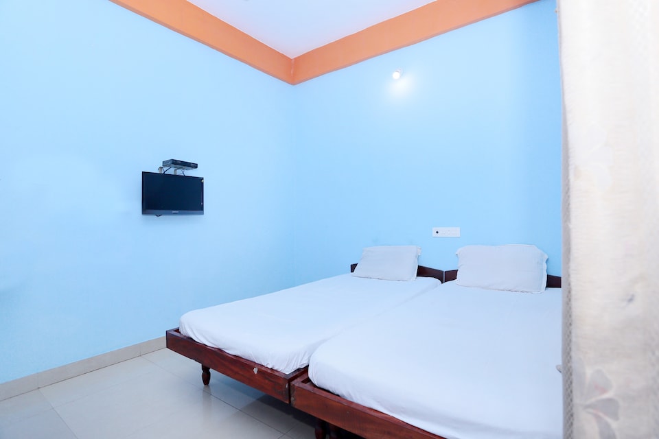 SPOT ON 36996 Manasa Tourist Home, M G Road Trivandrum, Trivandrum