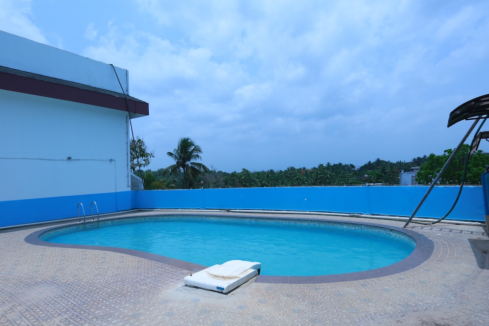 Capital O 38723 Hotel Polariz, Kannur, Kannur