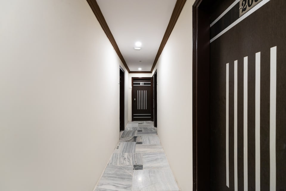 Hotel O Poonam Palace, Ashram Road Ahmedabad, Ahmedabad