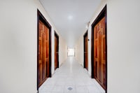 Super Hotel O Pathanamthitta Near Mahatma Gandhi Statue