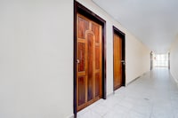 Super Hotel O Pathanamthitta Near Mahatma Gandhi Statue