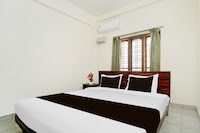 Super Hotel O Pathanamthitta Near Mahatma Gandhi Statue