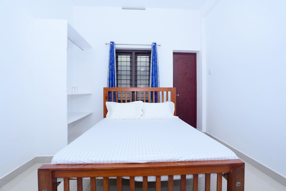 SPOT ON 47468 Jeevan Tourist Home, Thrissur, Thrissur