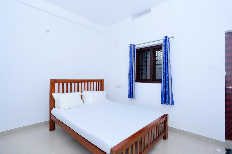 SPOT ON 47468 Jeevan Tourist Home, Thrissur, Thrissur