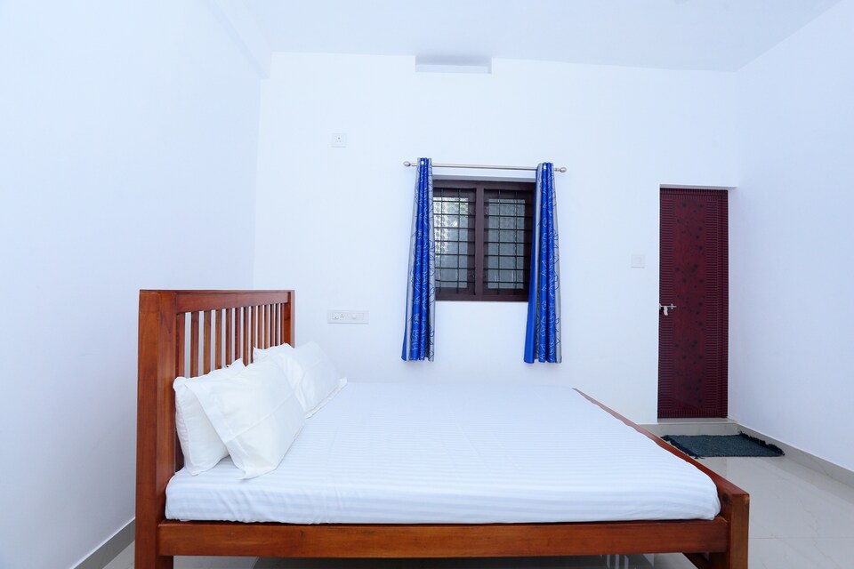 SPOT ON 47468 Jeevan Tourist Home, Thrissur, Thrissur