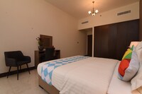 OYO Home 244 1BHK Pantheon boulevard JVC 