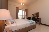 OYO Home 244 1BHK Pantheon boulevard JVC 