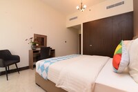 OYO Home 245 2BHK Pantheon boulevard JVC 