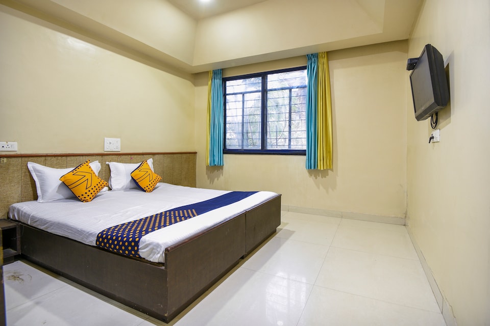 SPOT ON 64585 Buninda Holiday Resort, Pirangut, Pune