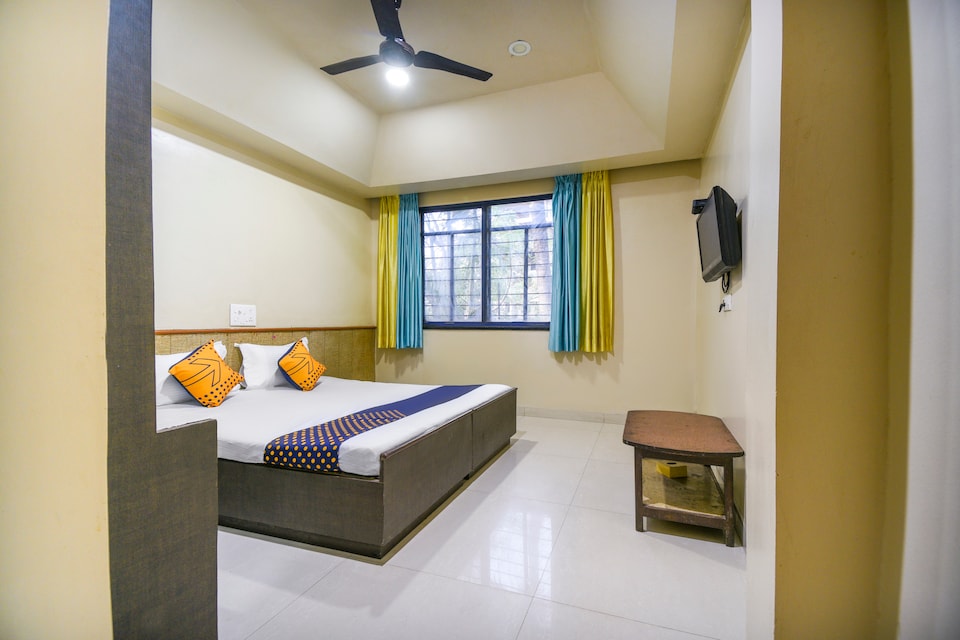 SPOT ON 64585 Buninda Holiday Resort, Pirangut, Pune