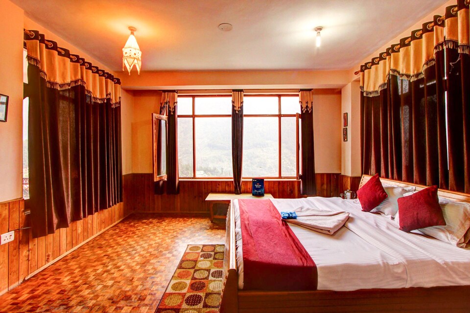 OYO 5374 Indraprastha Cottages, Hadimba Temple Road, Manali