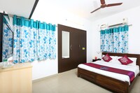 OYO Phoenix Hospitality Apartments Near Kasi Talkies