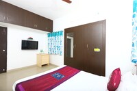OYO Phoenix Hospitality Apartments Near Kasi Talkies