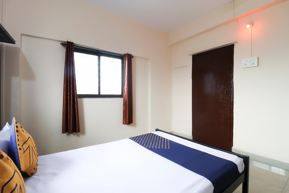 OYO 67172 Angan Lodge, Talegaon Lonavala , Lonavala