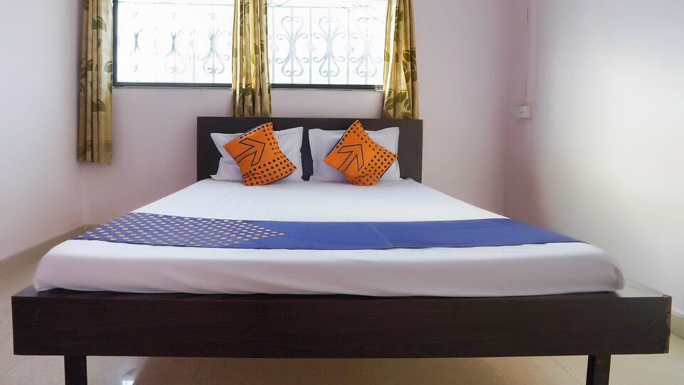 SPOT ON 67466 Shantai Lodge, Jejuri, Pune